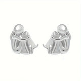 Hug Earrings in Silver and Gold